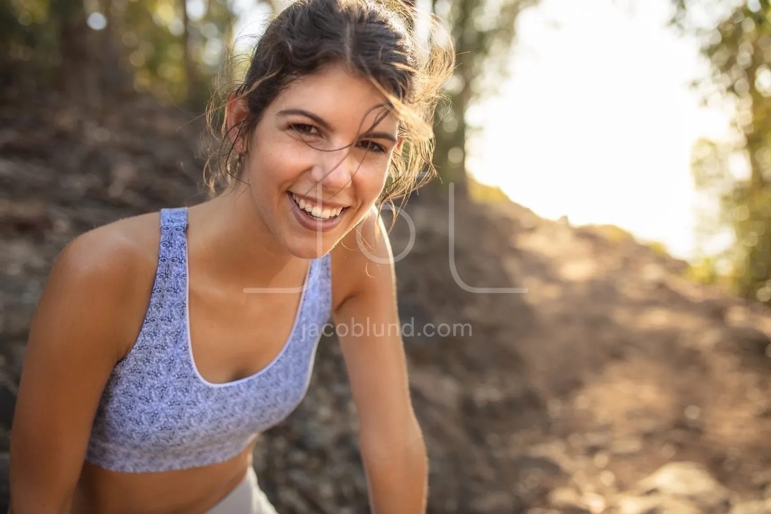 Beautiful woman relaxing after trail run